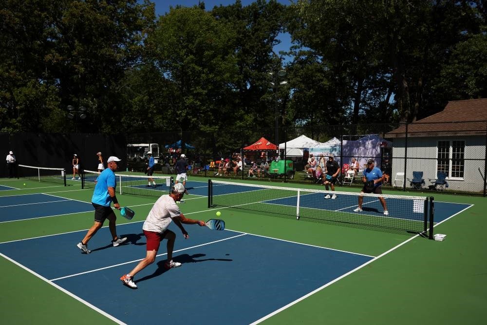 Players competing in a pickleball competition