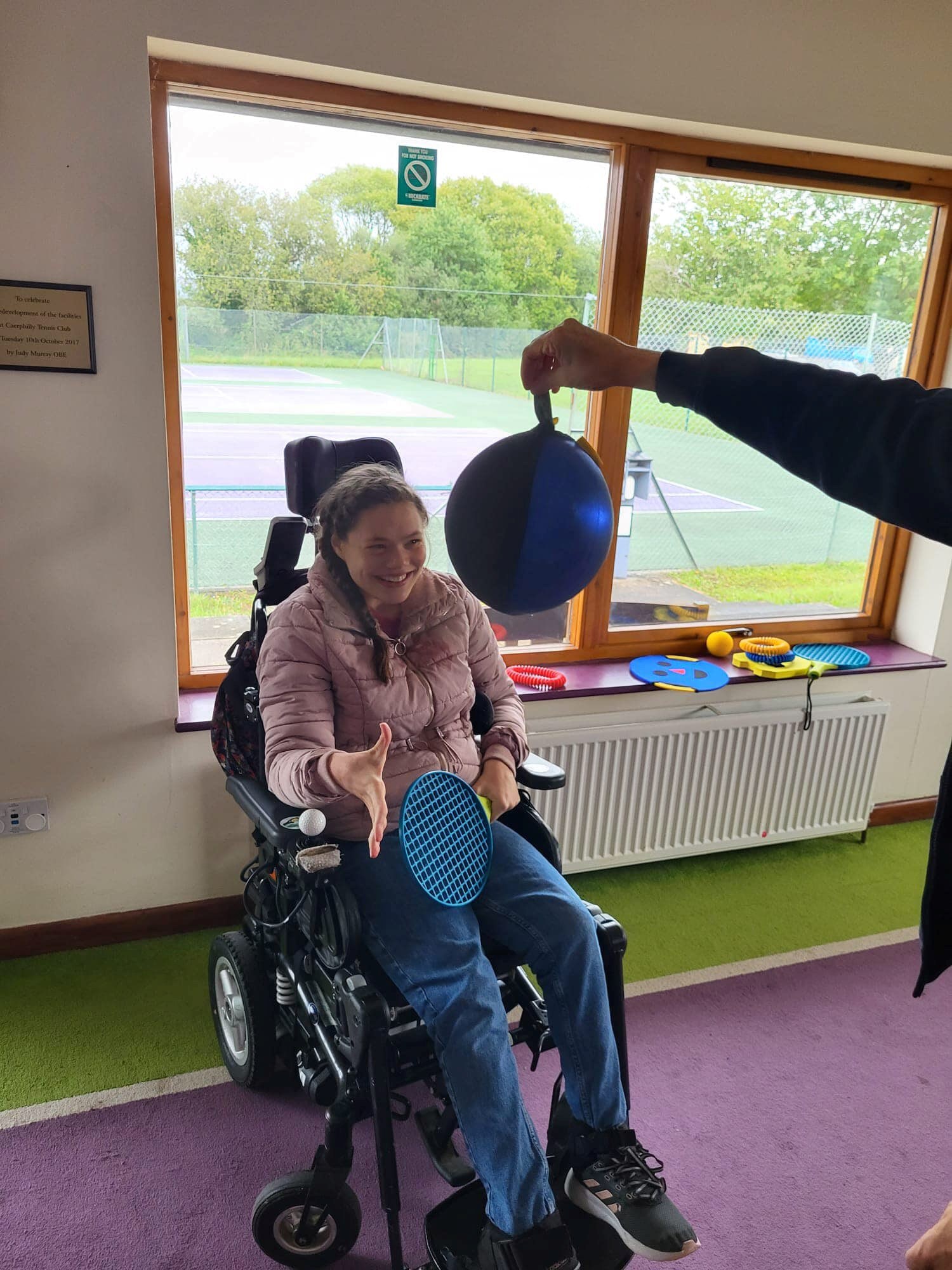 A member of the Caerphilly Sensory Tennis group in action during their weekly sessions that have now moved into their clubhouse during the winter months