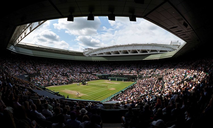 View of Wimbledon Centre Court with a full stadium of fans