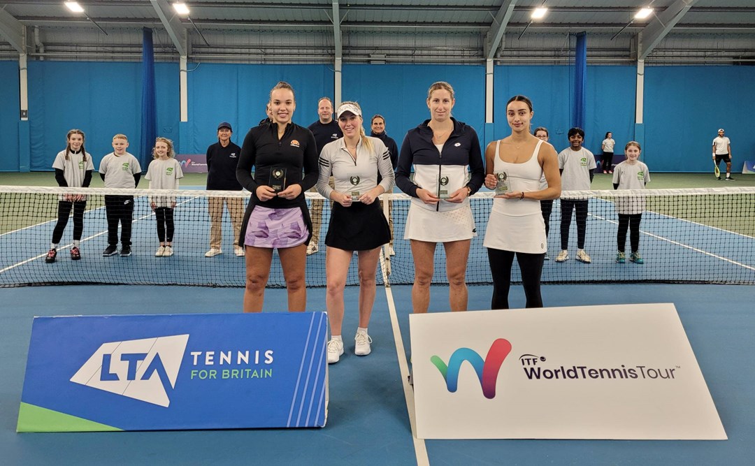 Freya Christie and Ali Collins with the W60 Sunderland doubles trophy