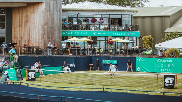 A view of Ilkley centre court with the clubhouse in the background