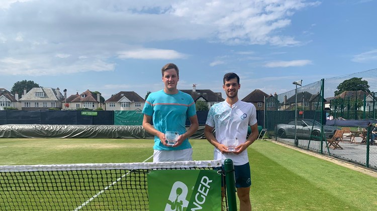 Julian Cash and Henry Patten holding the 2022 Surbiton Trophy doubles trophy