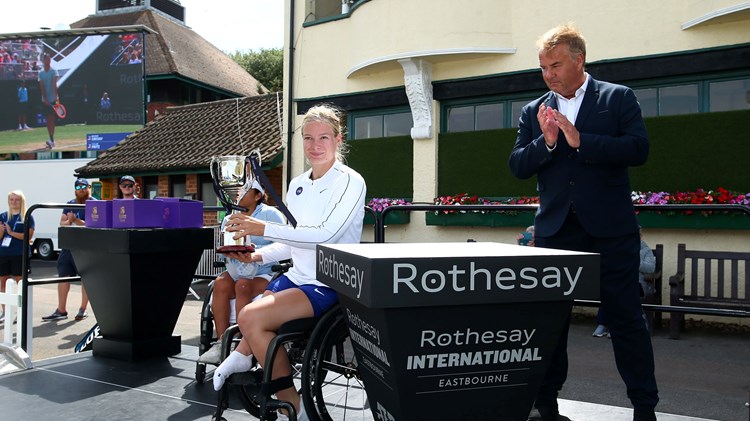 Diede de Groot posing with the trophy after winning the final of the women's single wheelchair final at the Rothesay International Eastbourne