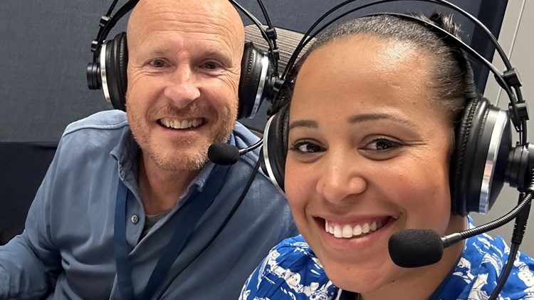 Yasmin Clarke in the broadcasting booth with Paul Hand