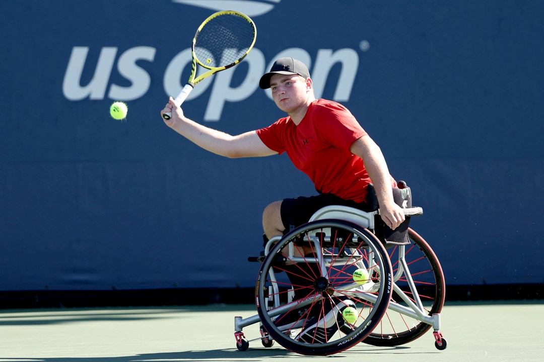 Andrew Penney lines up a forehand at the Junior Wheelchair US Open