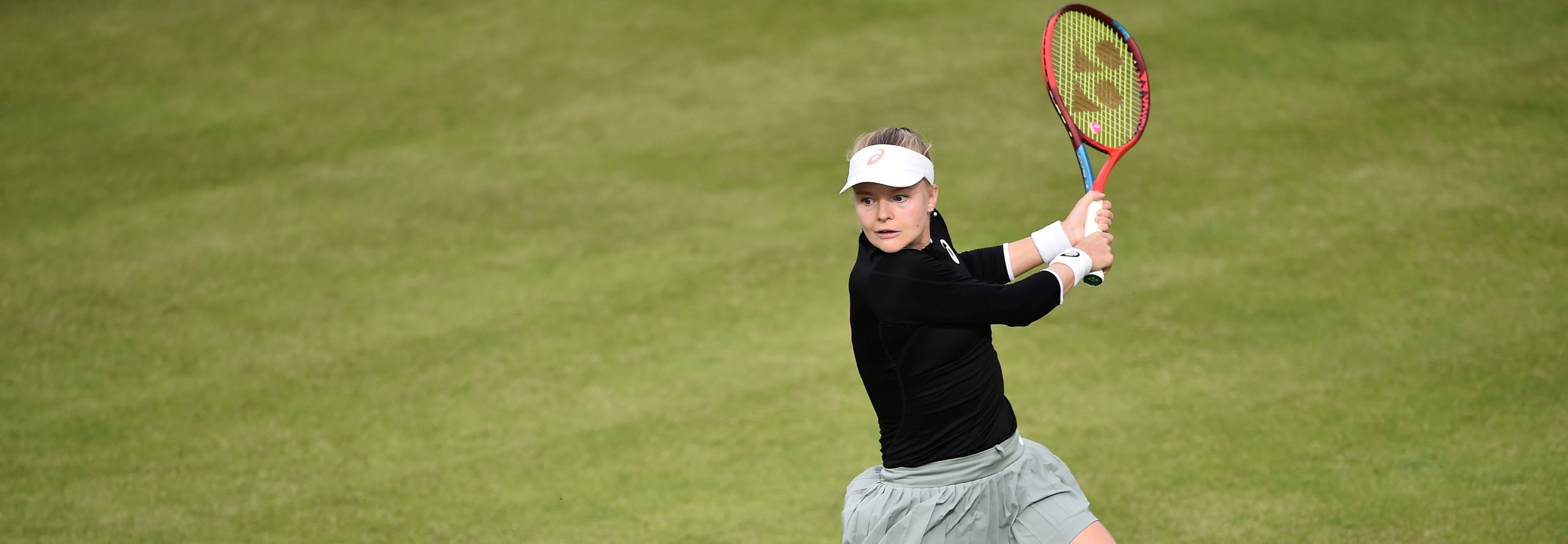 Harriet Dart of Great Britain plays a forehand shot