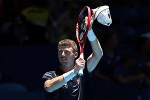 Billy Harris applauds the crowd after winning his first match against Japan at the 2026 United Cup