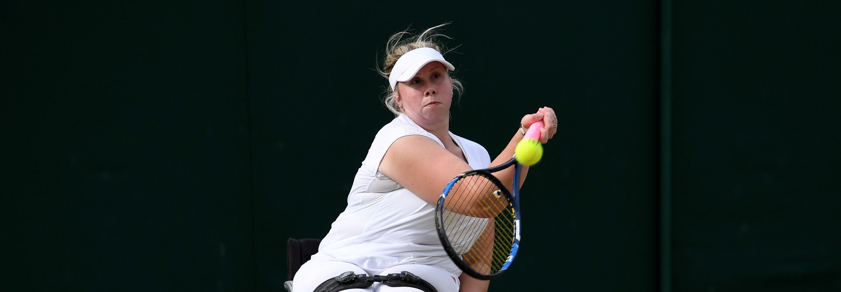 Louise Hunt of Great Britain plays a backhand