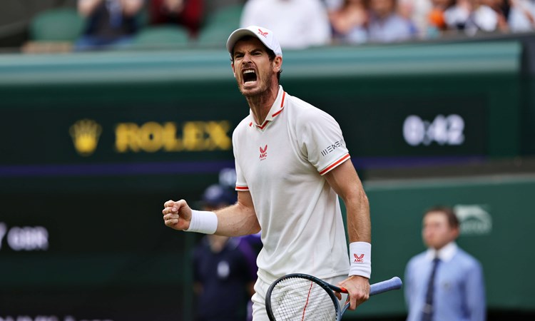Andy Murray of Great Britain celebrates in his Men's Singles First Round match against Nikoloz Basilashvili of Georgia during Day One of The Championships - Wimbledon 2021