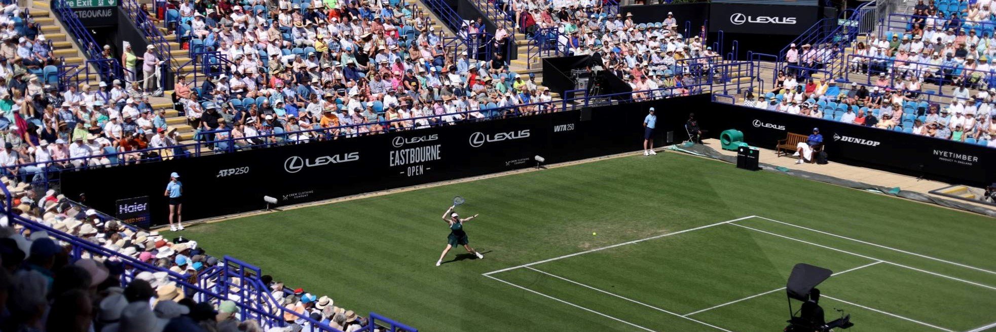View of the centre court at the Lexus Eastbourne Open in 2025 as a player hits a forehand