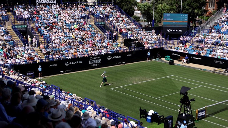 View of the centre court at the Lexus Eastbourne Open in 2025 as a player hits a forehand