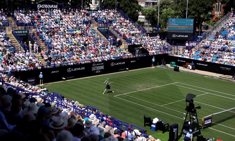View of the centre court at the Lexus Eastbourne Open in 2025 as a player hits a forehand