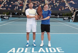 Lloyd Glasspool and Harri Heliovaara holding the 2023 Adelaide doubles title