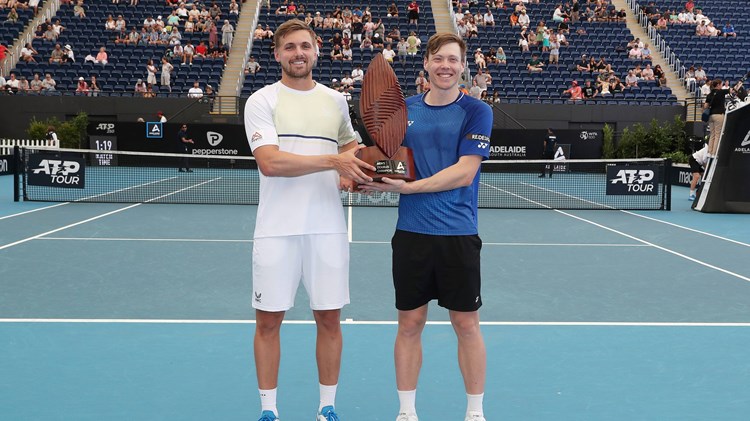 Lloyd Glasspool and Harri Heliovaara holding the 2023 Adelaide doubles title