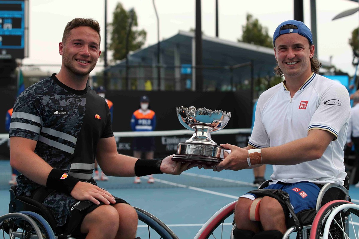 Alfie Hewett and Gordon Reid lifting the Australian Open wheelchair doubles title in 2022