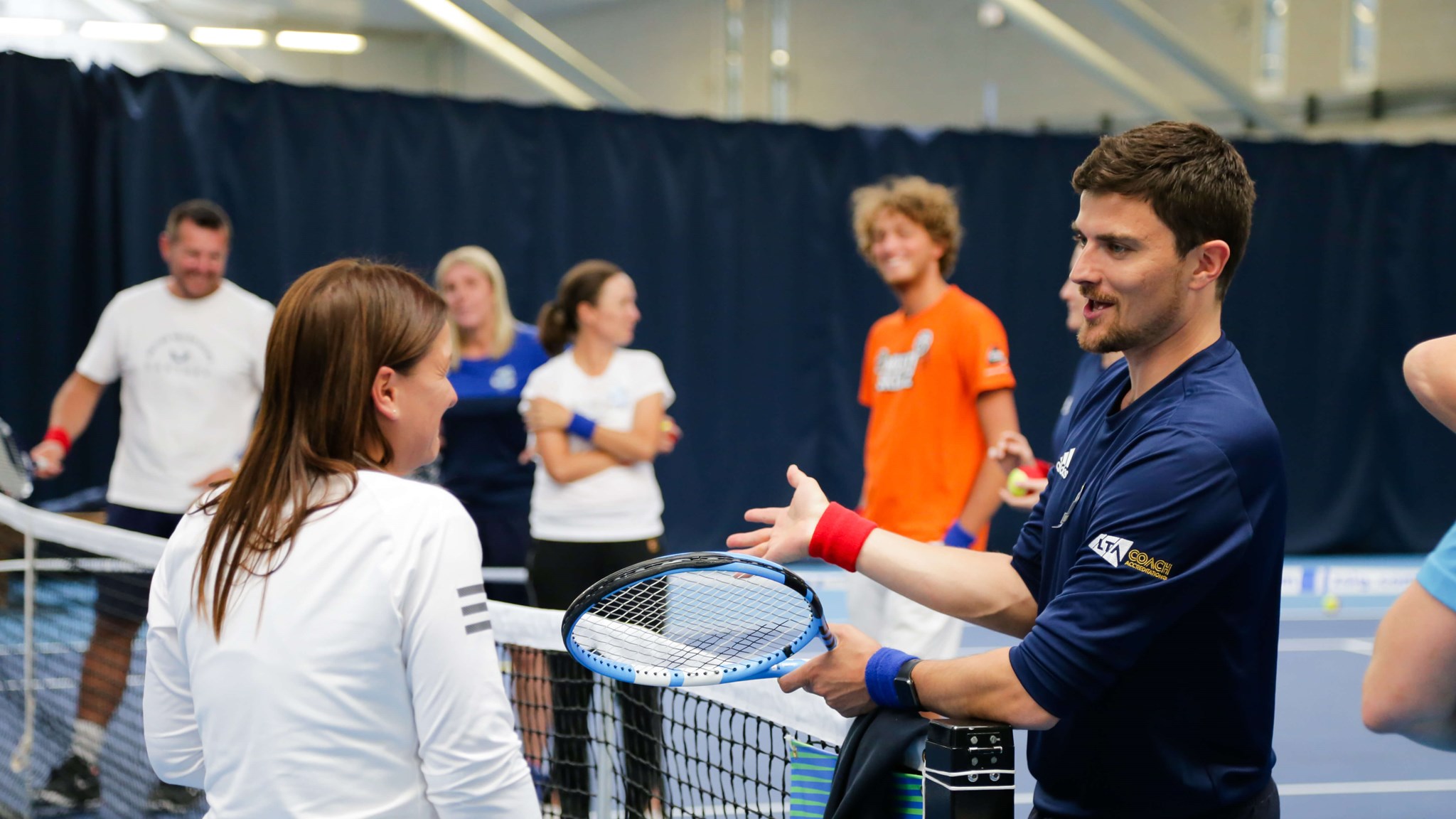 LTA coach with player 