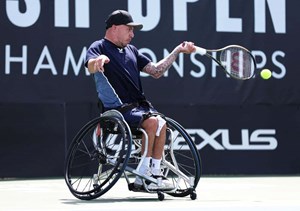 Andy Lapthorne hitting a forehand at the British Open