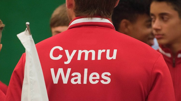 Back of man in Cymru Wales shirt