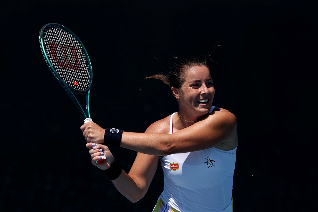 British tennis player Jodie Burrage hitting a backhand shot at the 2025 Australian Open
