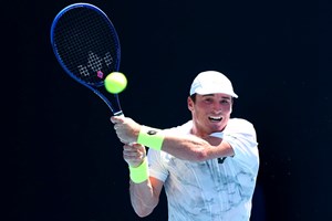 Oliver Crawford hitting a backhand at the Australian Open 2024