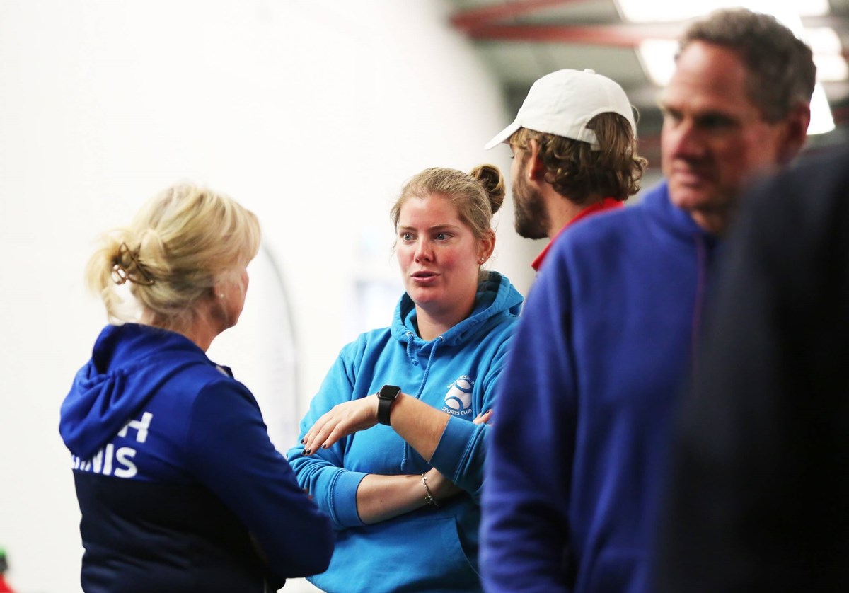 Coaches chat at networking event.jpg