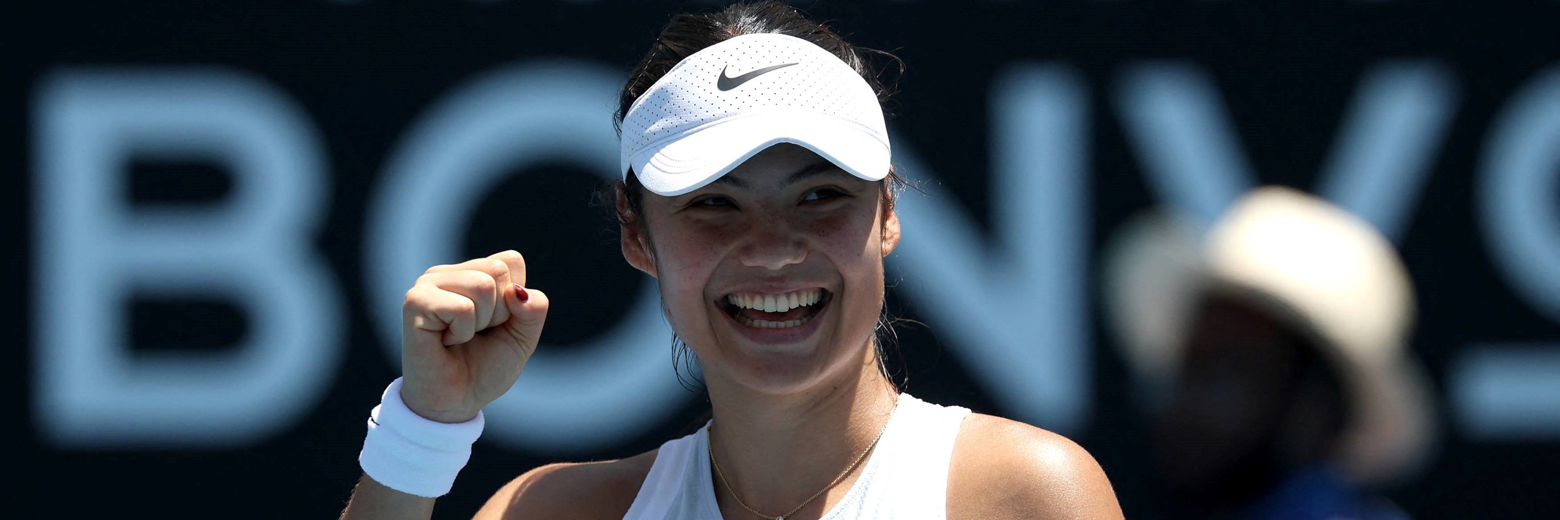 Emma Raducanu smiles after coming through the first round of the Australian Open against 26th seed Ekaterina Alexandrova