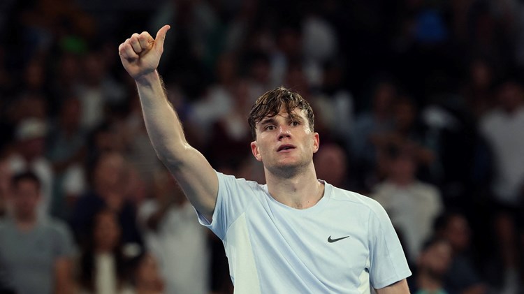 Jack Draper gives a thumbs up to the crowd after beating Thanasi Kokkinakis in the second round of the Australian Open