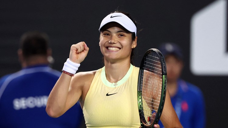 Emma Raducanu clenching her first in celebration after winning her opening round match at the Australian Open