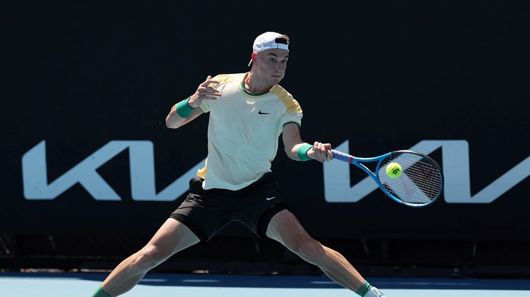Jack Draper hits a forehand in the first round of the Australian Open