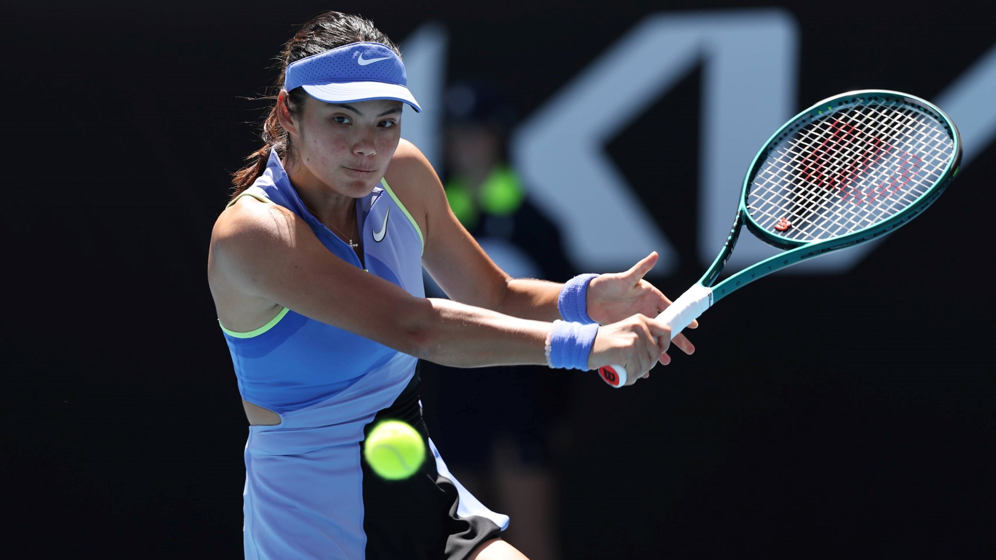 Emma Raducanu lines up a backhand at the Australian Open