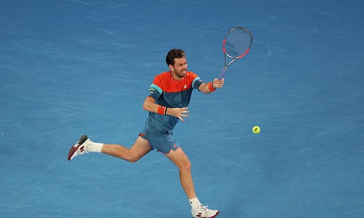 Cam Norrie strikes a forehand against Alexander Zverev in the third round of the Australian Open