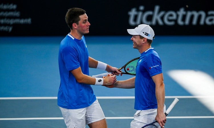 Henry Patten and Harri Heliovaara high five in the Adelaide International final