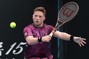 Alfie Hewett hits a backhand in the first round of the Australian Open