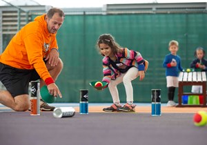 A coach running an LTA Youth session