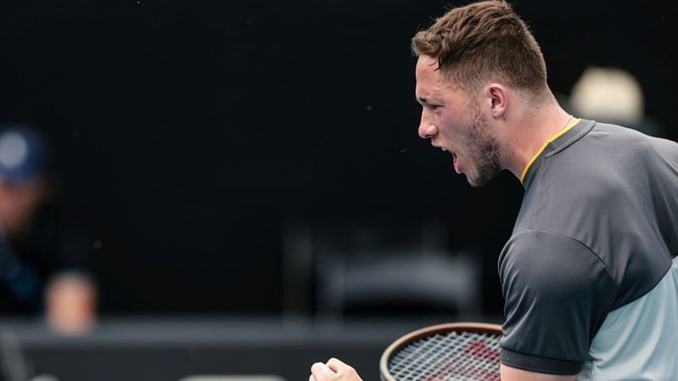 Alfie Hewett clenching his fist in celebration after reaching the final of the Australian Open