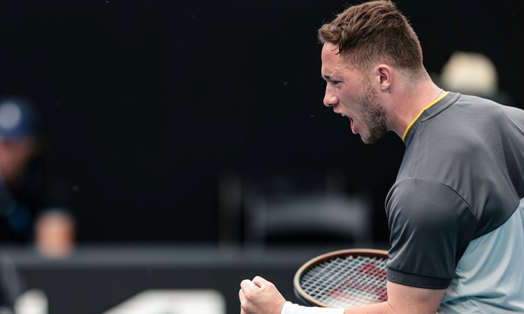 Alfie Hewett clenching his fist in celebration after reaching the final of the Australian Open