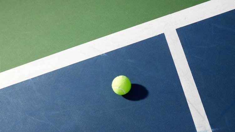 Tennis ball on court