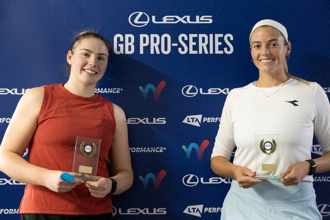 British tennis player Amelia Rajecki holding her doubles trophy at the Lexus British Pro Series Sunderland event with Anna Rogers