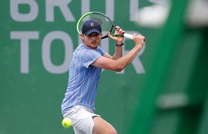 Aidan Mchugh hits a backhand during his Quarter Final match against Henry Patten during Day Two of Week Four of the British Tour at National Tennis Centre on July 24, 2020 in London, England.