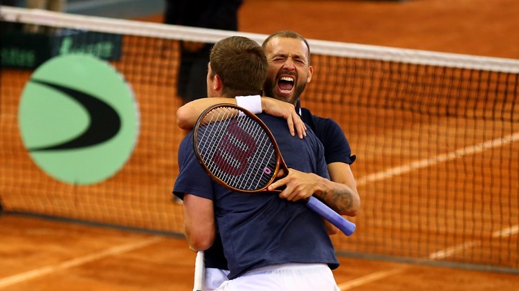 Dan Evans and Neal Skupski celebrate a victory at the Davis Cup Finals Qualifiers in Colombia