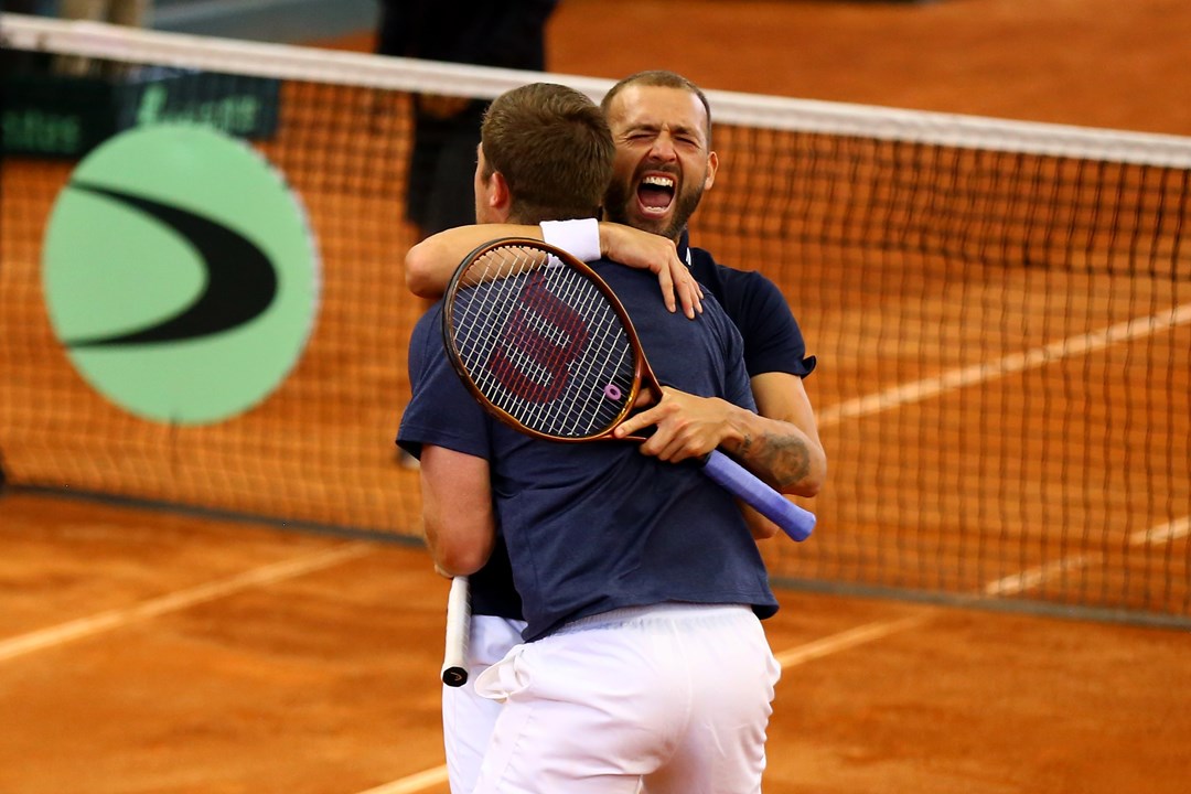 Dan Evans and Neal Skupski celebrate a victory at the Davis Cup Finals Qualifiers in Colombia