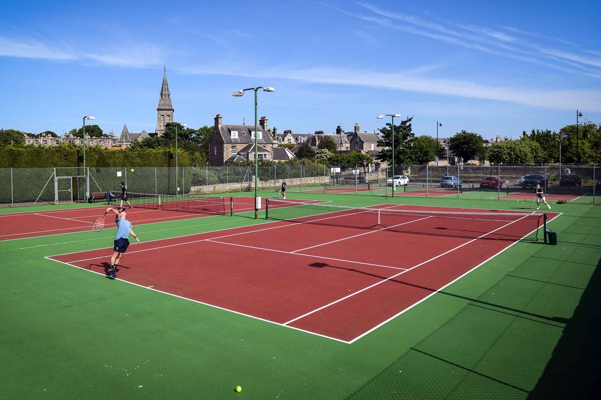 Players on a local tennis court.jpg