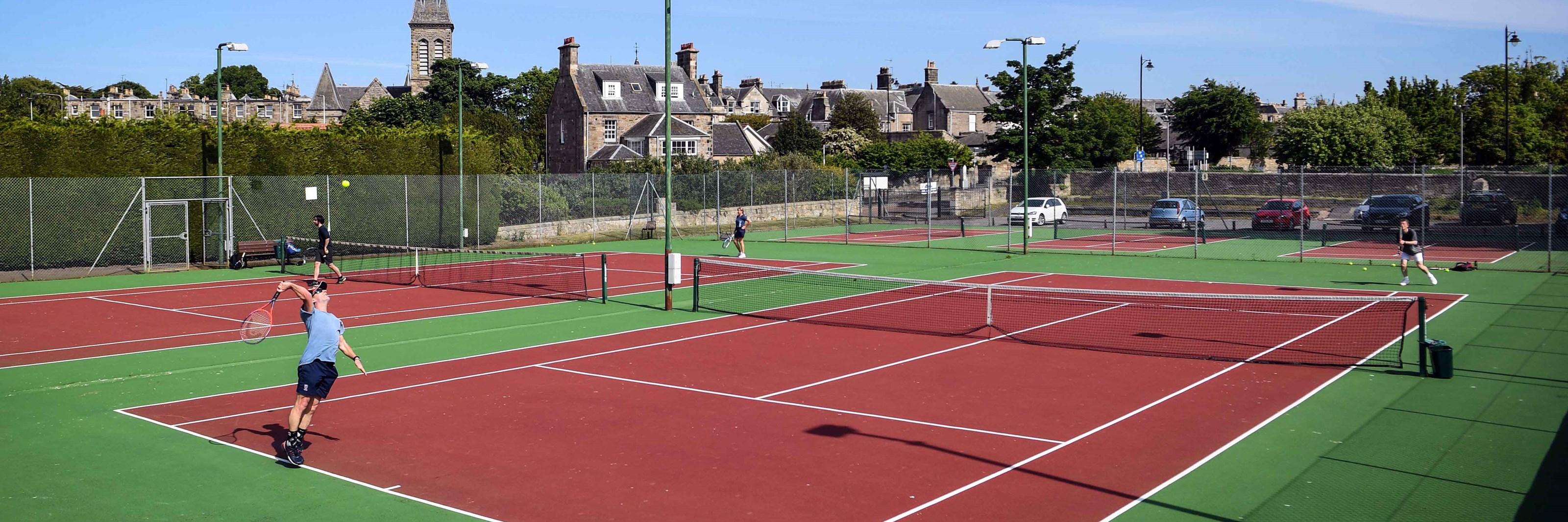 Match taking place on local club courts