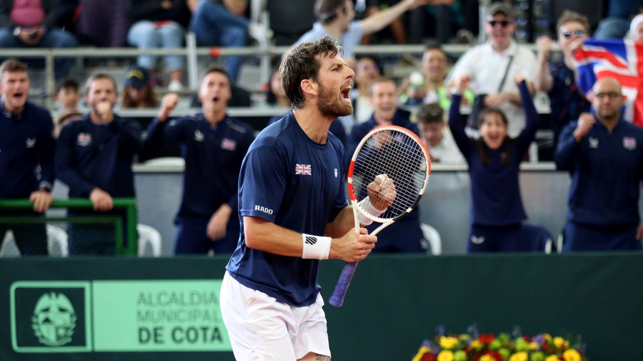 Cam Norrie roars after securing the win for Great Britain against Colombia in the Davis Cup