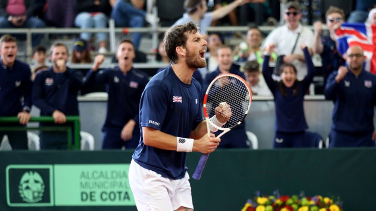 Cam Norrie roars after securing the win for Great Britain against Colombia in the Davis Cup