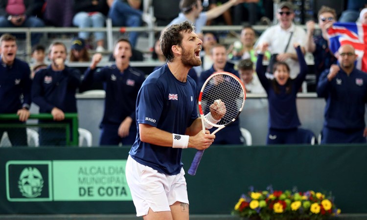 Cam Norrie roars after securing the win for Great Britain against Colombia in the Davis Cup