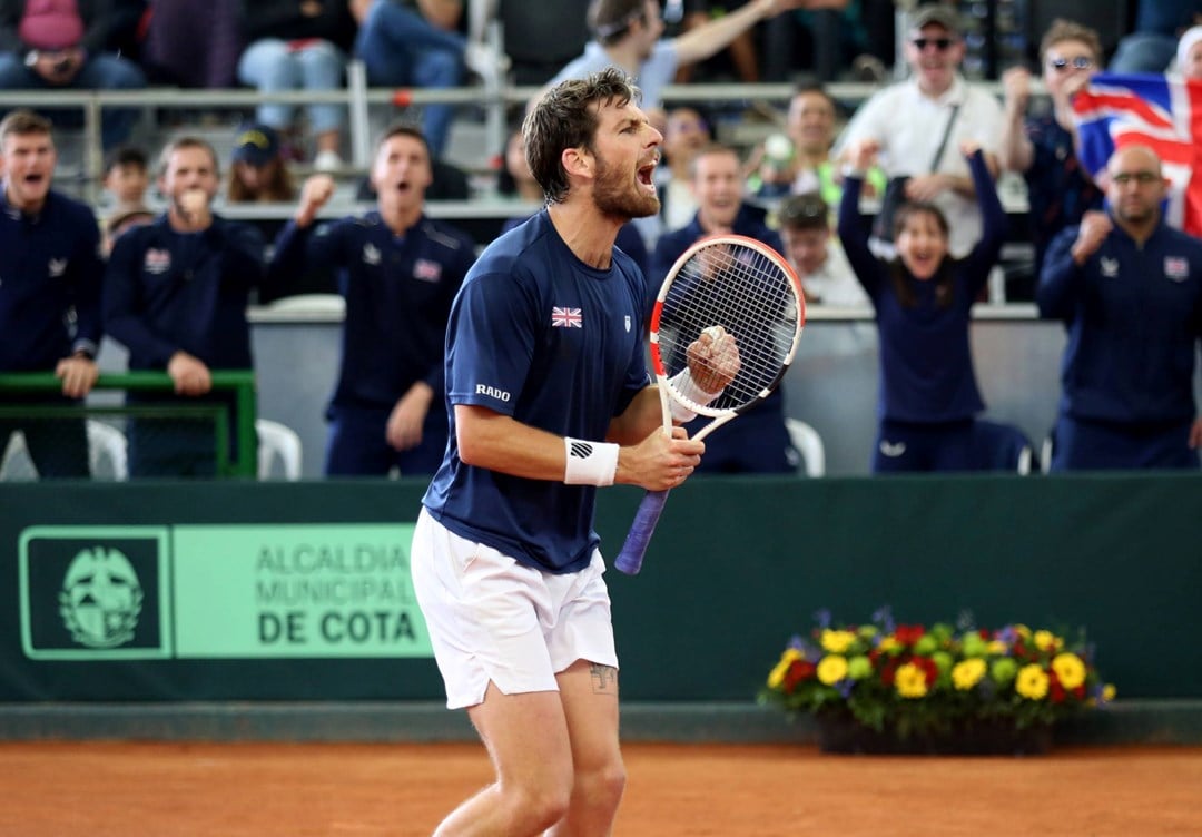 Cam Norrie roars after securing the win for Great Britain against Colombia in the Davis Cup