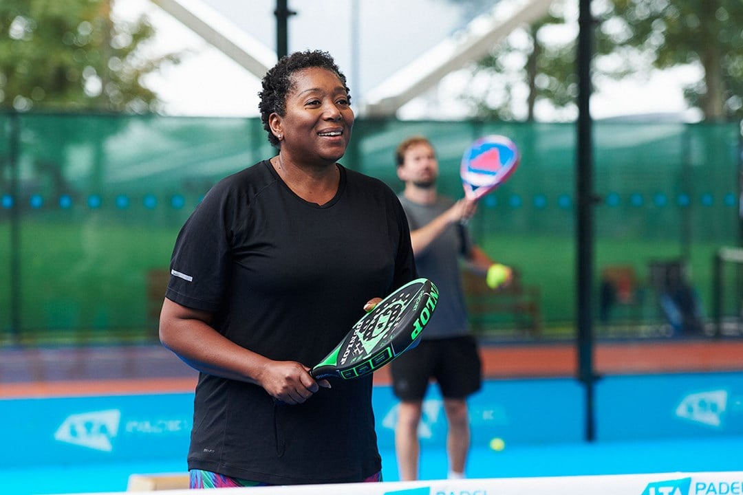 Woman playing padel