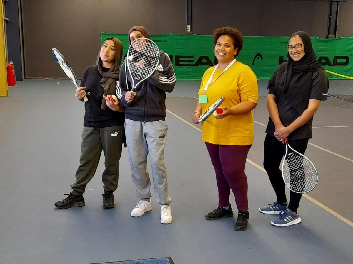 A group of women take part in an LTA Serves course