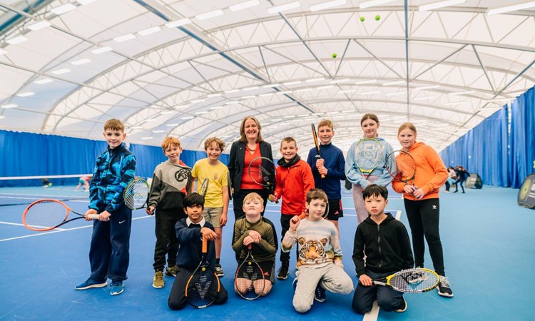 Kids on court at the opening of the Oriam Indoor Tennis Centre